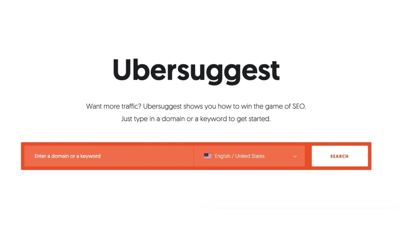Screenshot of the Ubersuggest SEO tool homepage with a keyword search bar for domain and keyword research.